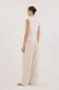 FELICITY OFF WHITE SLEEVELESS WRAP TOP sold by Dissh
