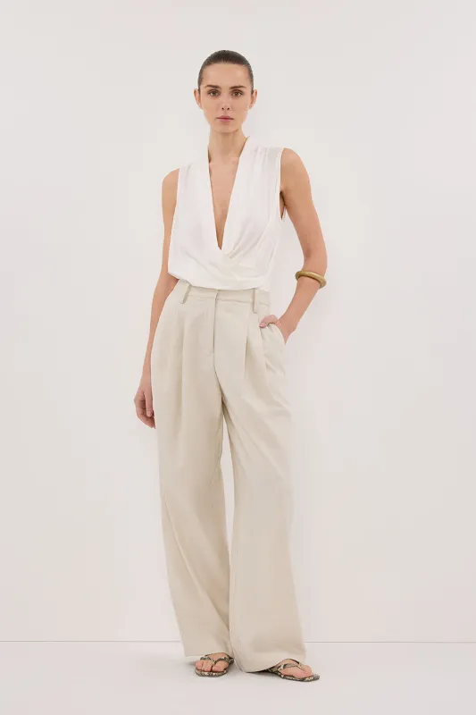 FELICITY OFF WHITE SLEEVELESS WRAP TOP sold by Dissh