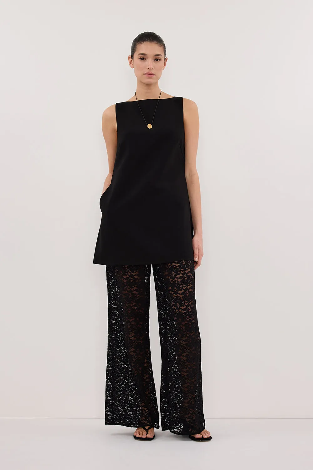 ROWIE BLACK SLEEVELESS BOAT NECK TUNIC TOP sold by Dissh