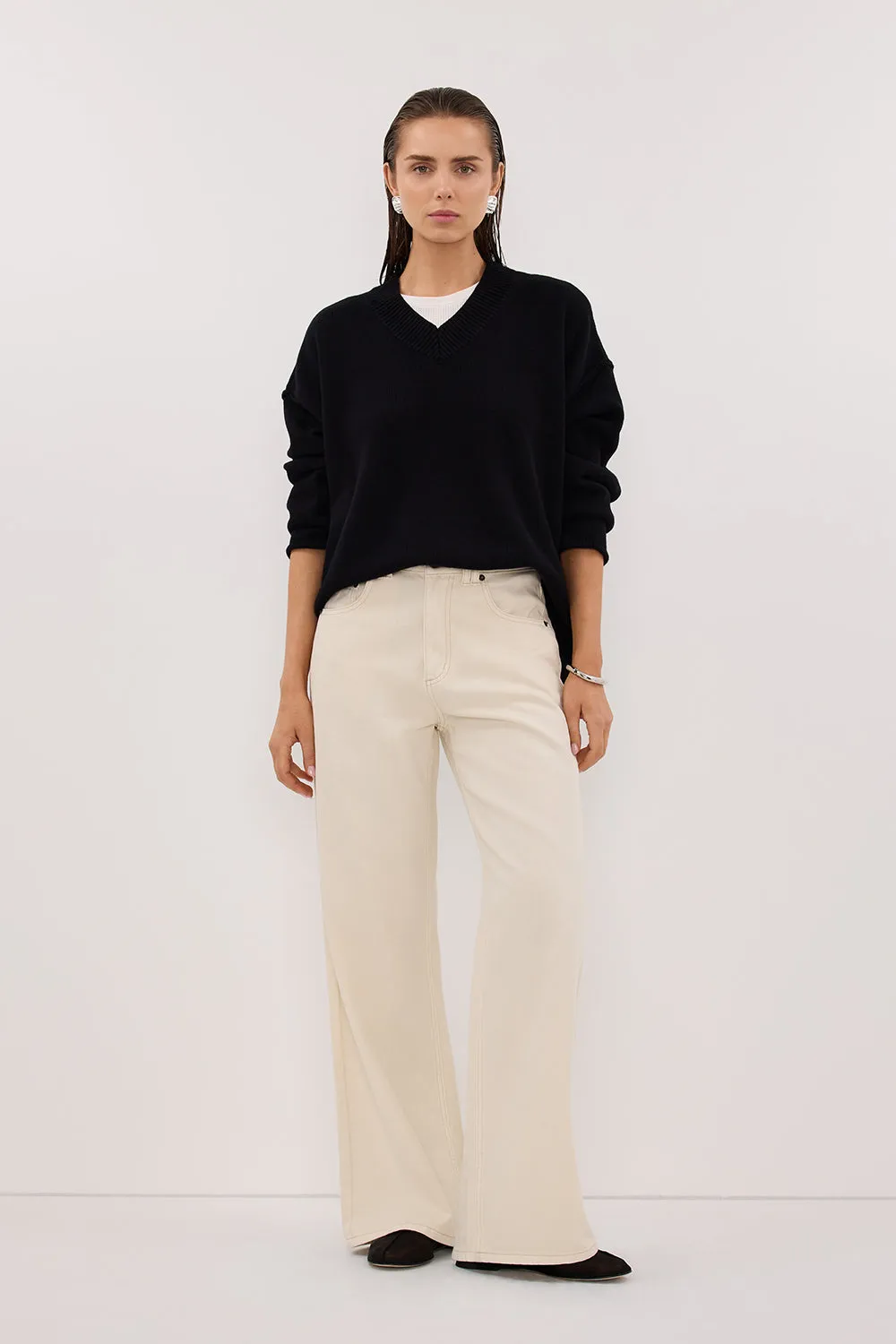 FLINT BLACK V NECK KNIT JUMPER sold by Dissh