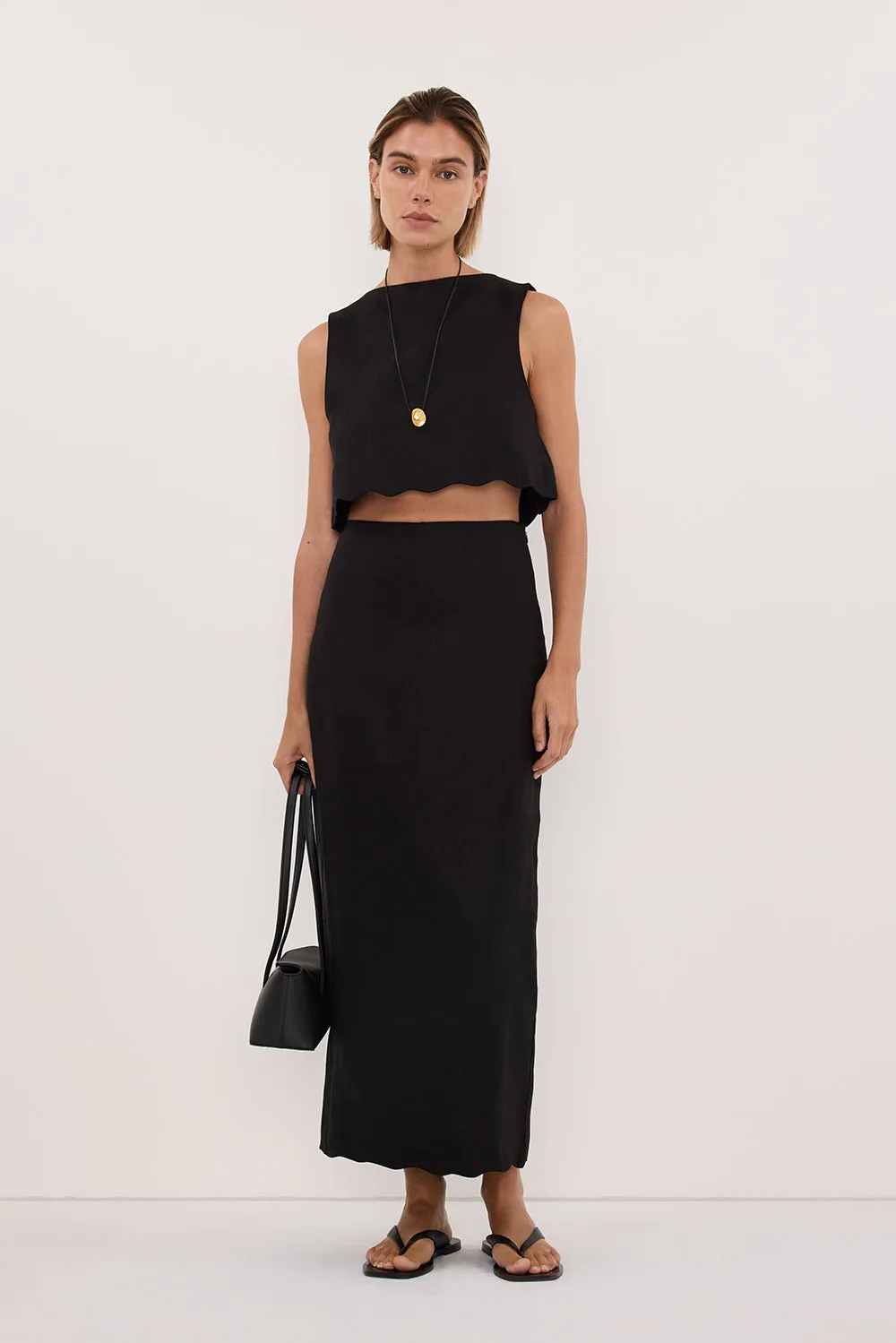 LELA BLACK LINEN MIDI SKIRT sold by Dissh