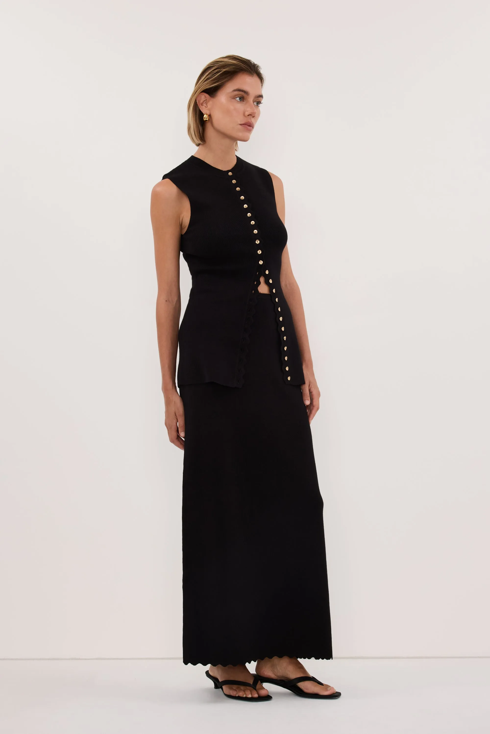 ZOE BLACK SCALLOPED KNIT MIDI SKIRT sold by Dissh product image thumbnail 3