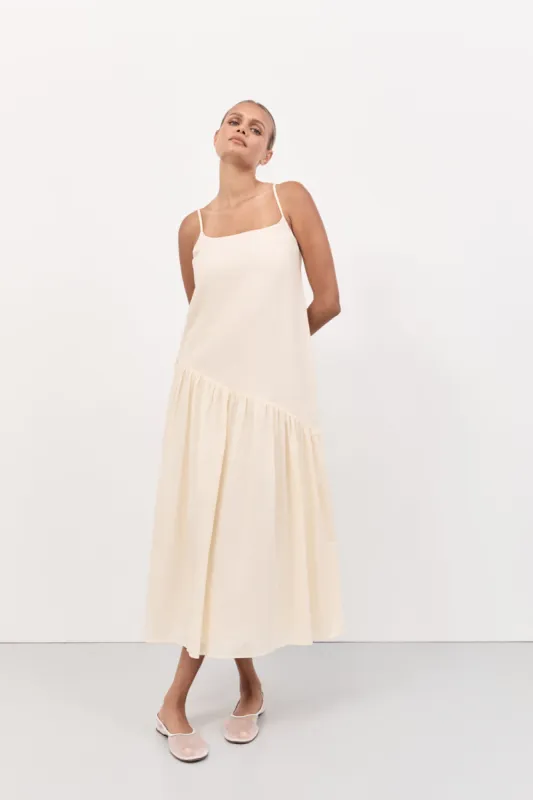 NOAH LEMON LINEN ASYM MIDI DRESS sold by Dissh