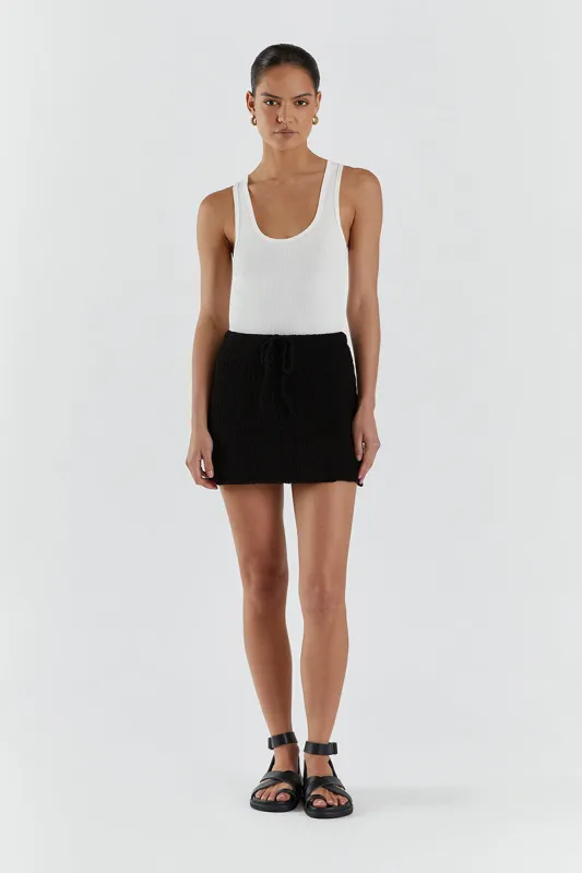 DION BLACK BOUCLE MINI SKIRT sold by Dissh