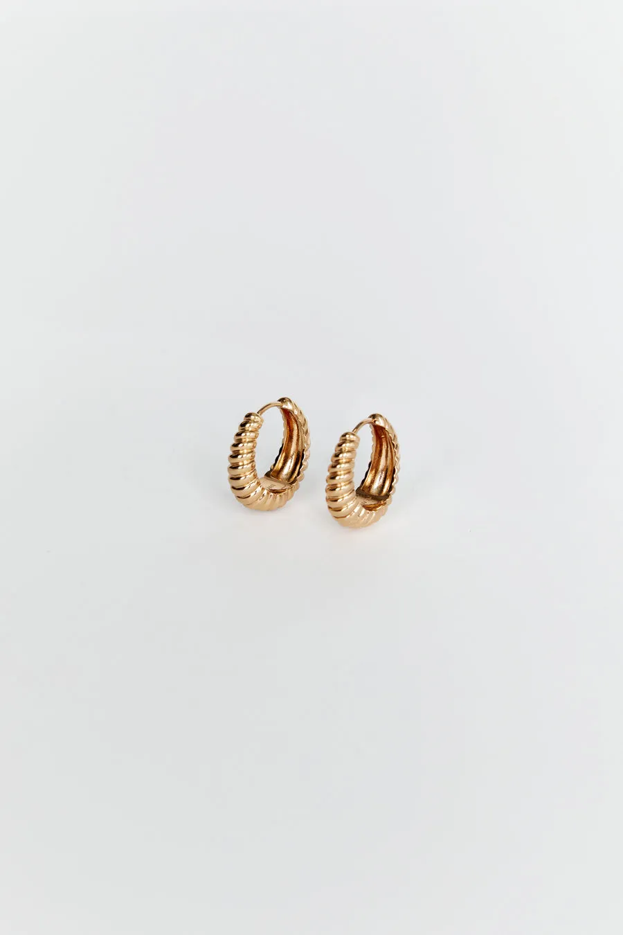 LUV AJ RIDGED MARABELLA GOLD HOOP EARRINGS sold by Dissh