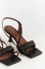 ALOHAS ASYMMETREIC BLACK HEEL sold by Dissh