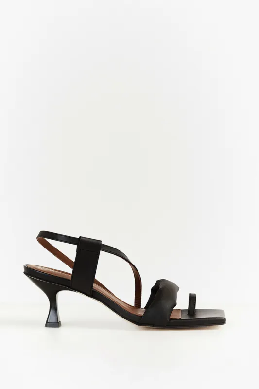 ALOHAS ASYMMETREIC BLACK HEEL sold by Dissh