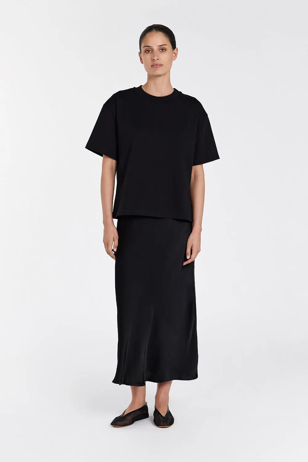 EMELIA BLACK SATIN MIDI SKIRT sold by Dissh