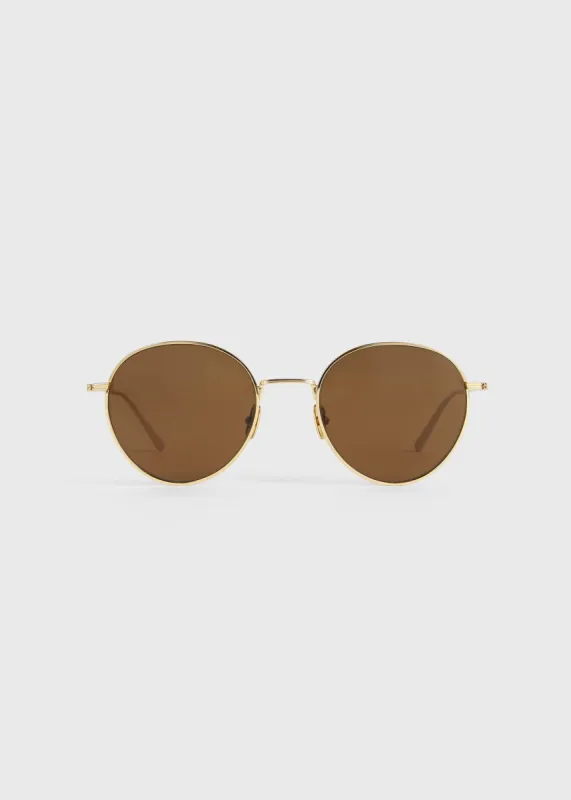 Round sunglasses gold made by Toteme