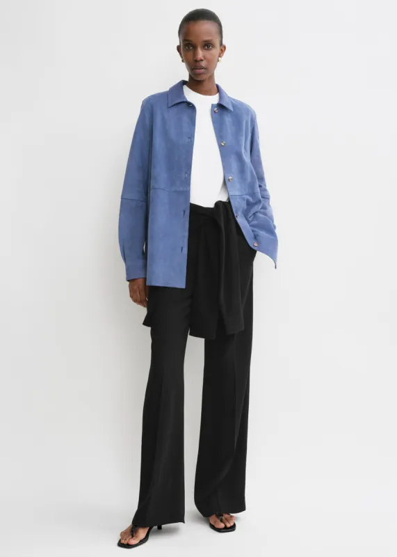 Soft suede shirt vibrant blue sold by Toteme