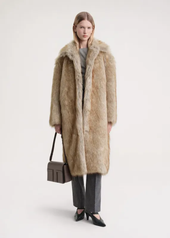 Faux-fur coat beige sold by Toteme