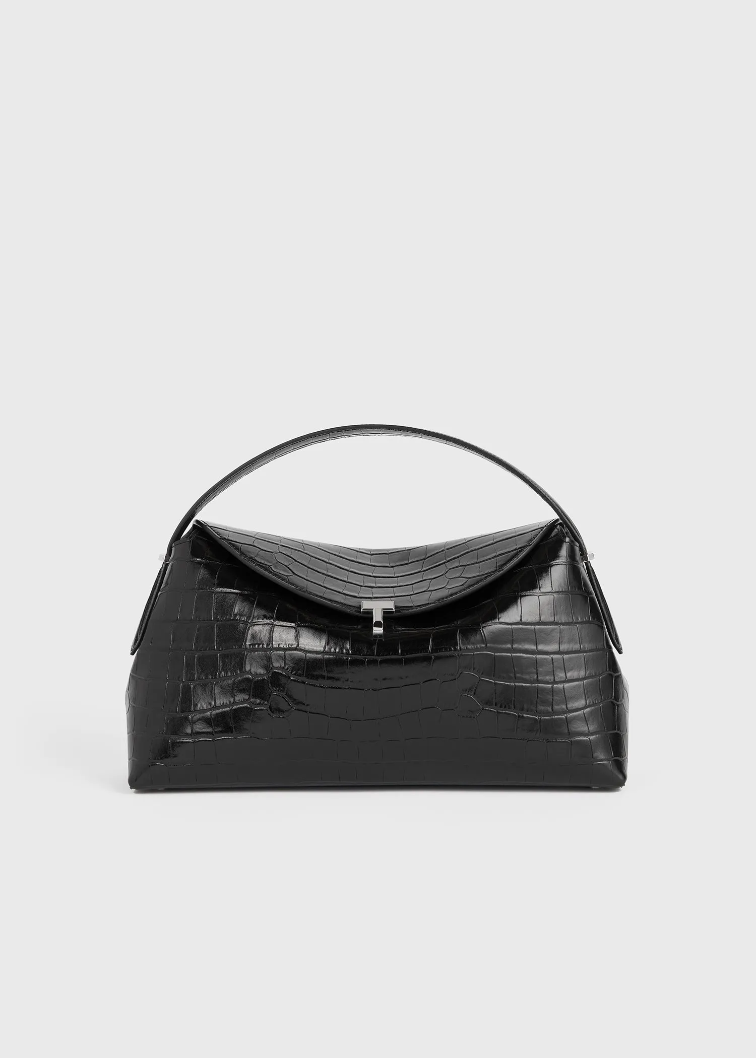 T-lock croco-embossed top handle black sold by Toteme