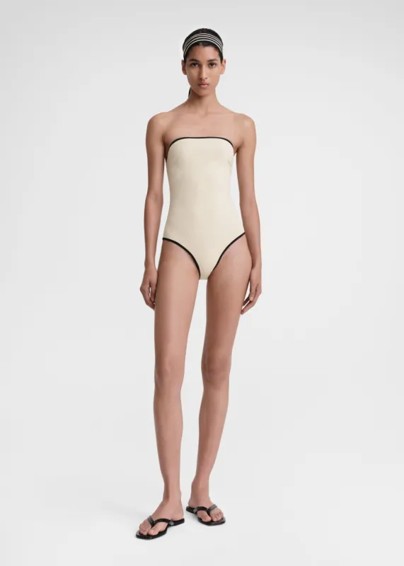 Stripe edge strapless swimsuit light hay sold by Toteme