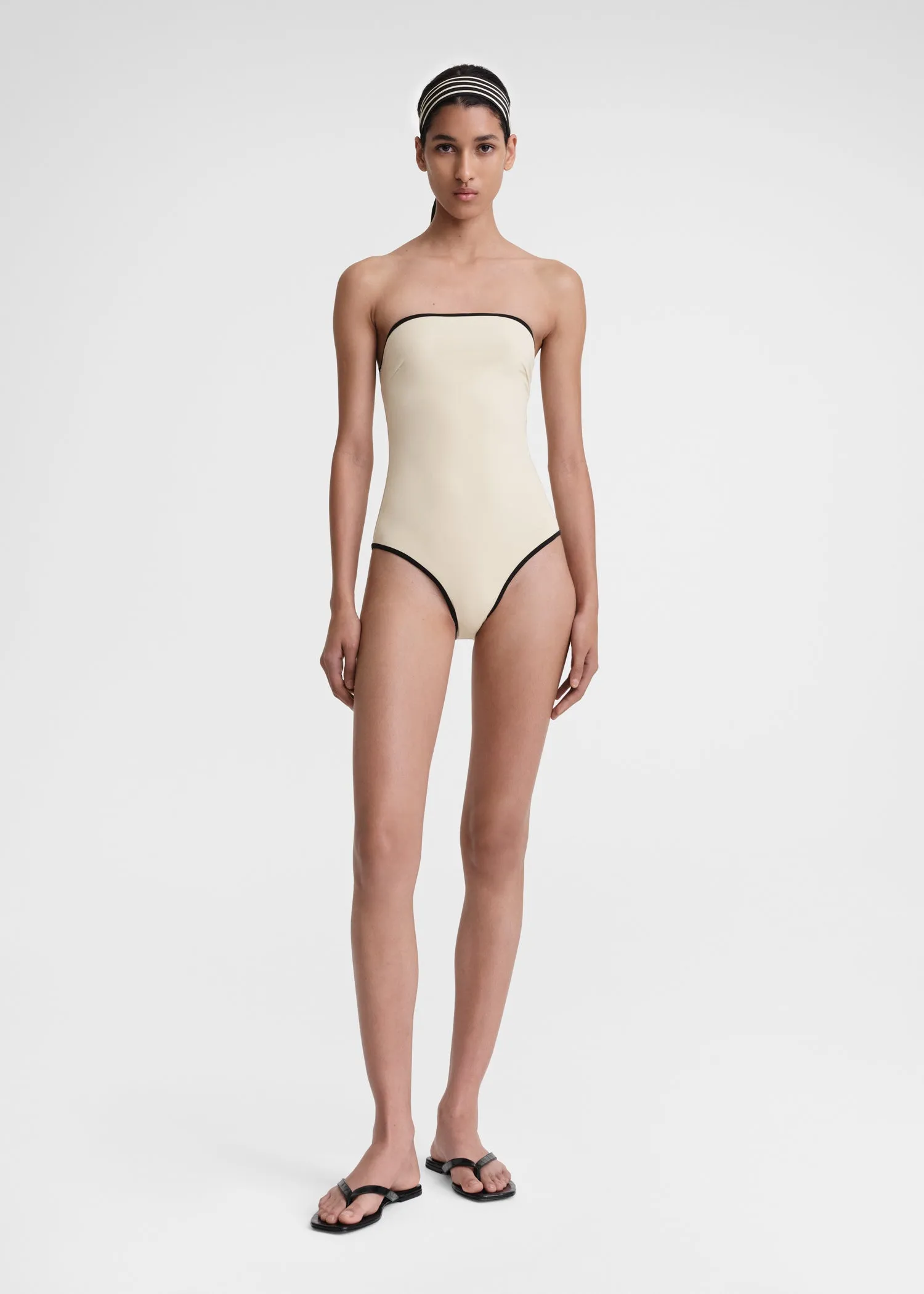 Stripe edge strapless swimsuit light hay sold by Toteme