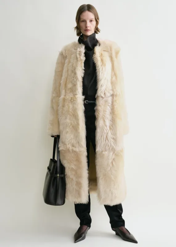 Silky shearling coat eggnog sold by Toteme