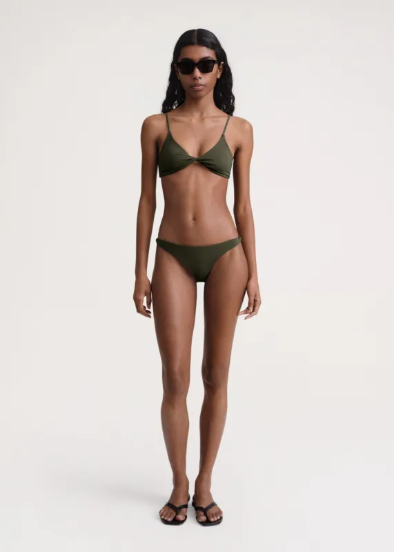 Twist-front bikini top faded olive sold by Toteme