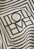Signature monogram silk blanket scarf creme sold by Toteme