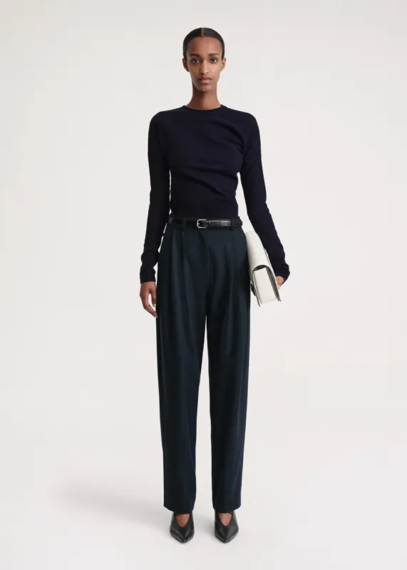Double-pleated tailored trousers navy sold by Toteme