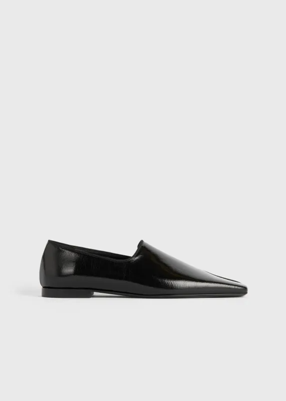 Piped Naplack loafers black made by Toteme