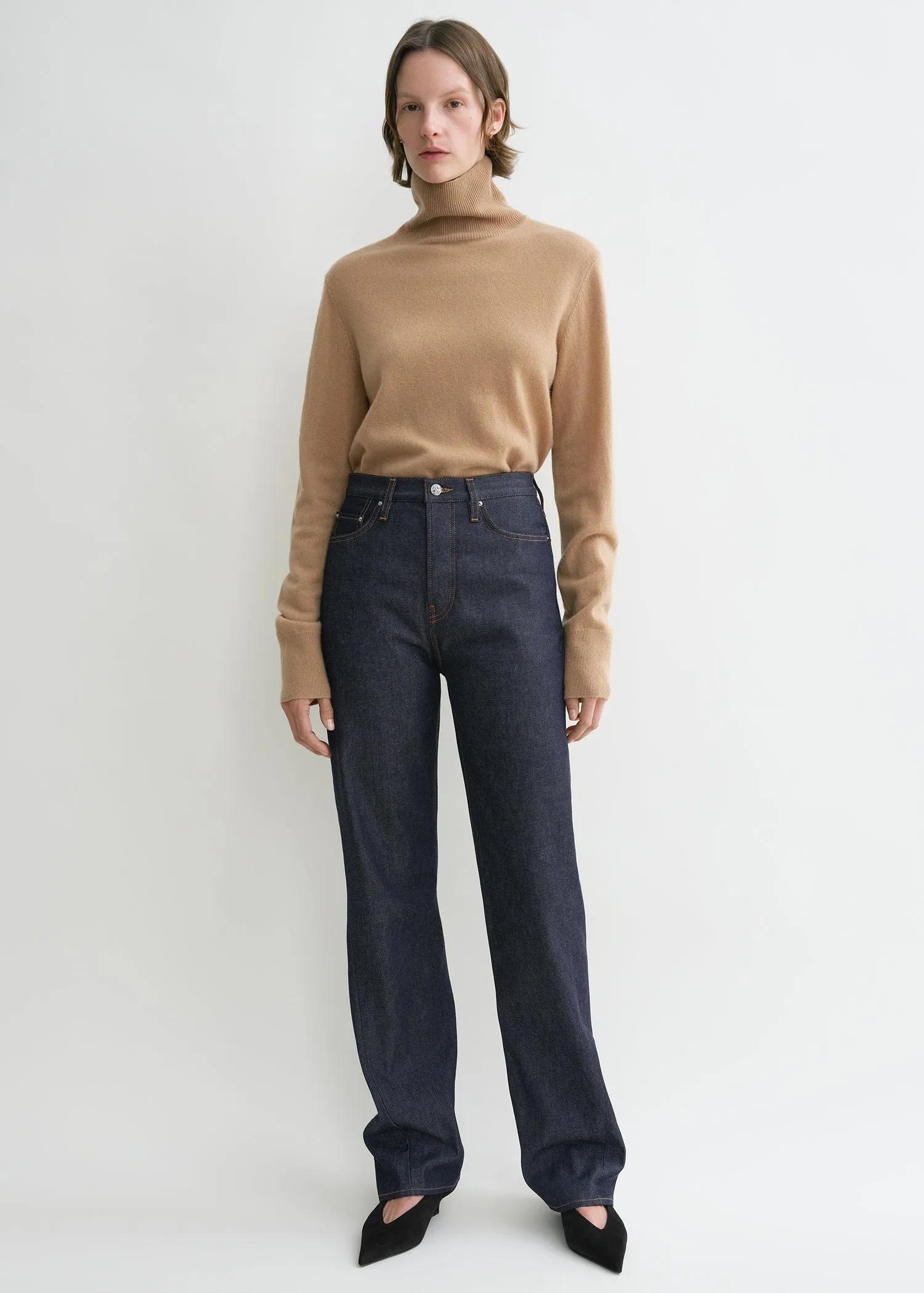 Twisted seam denim full length raw blue sold by Toteme