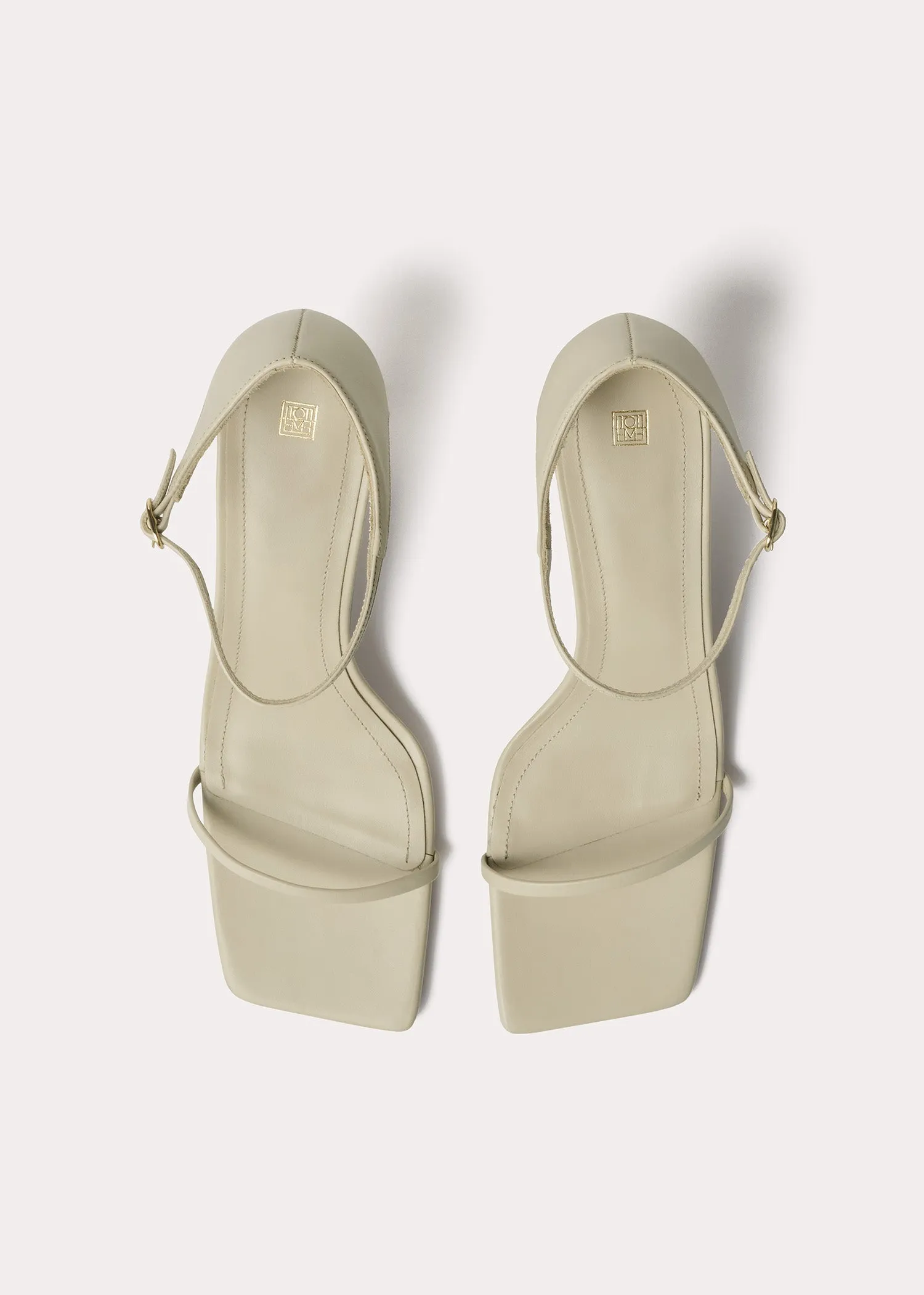 The Strappy Sandal bleached sand sold by Toteme product image thumbnail 2