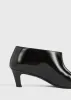 Wide shaft shoes black sold by Toteme