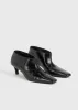 Wide shaft shoes black sold by Toteme