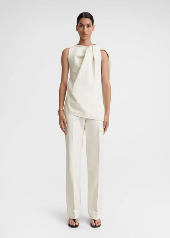 Shoulder-twist top ecru sold by Toteme