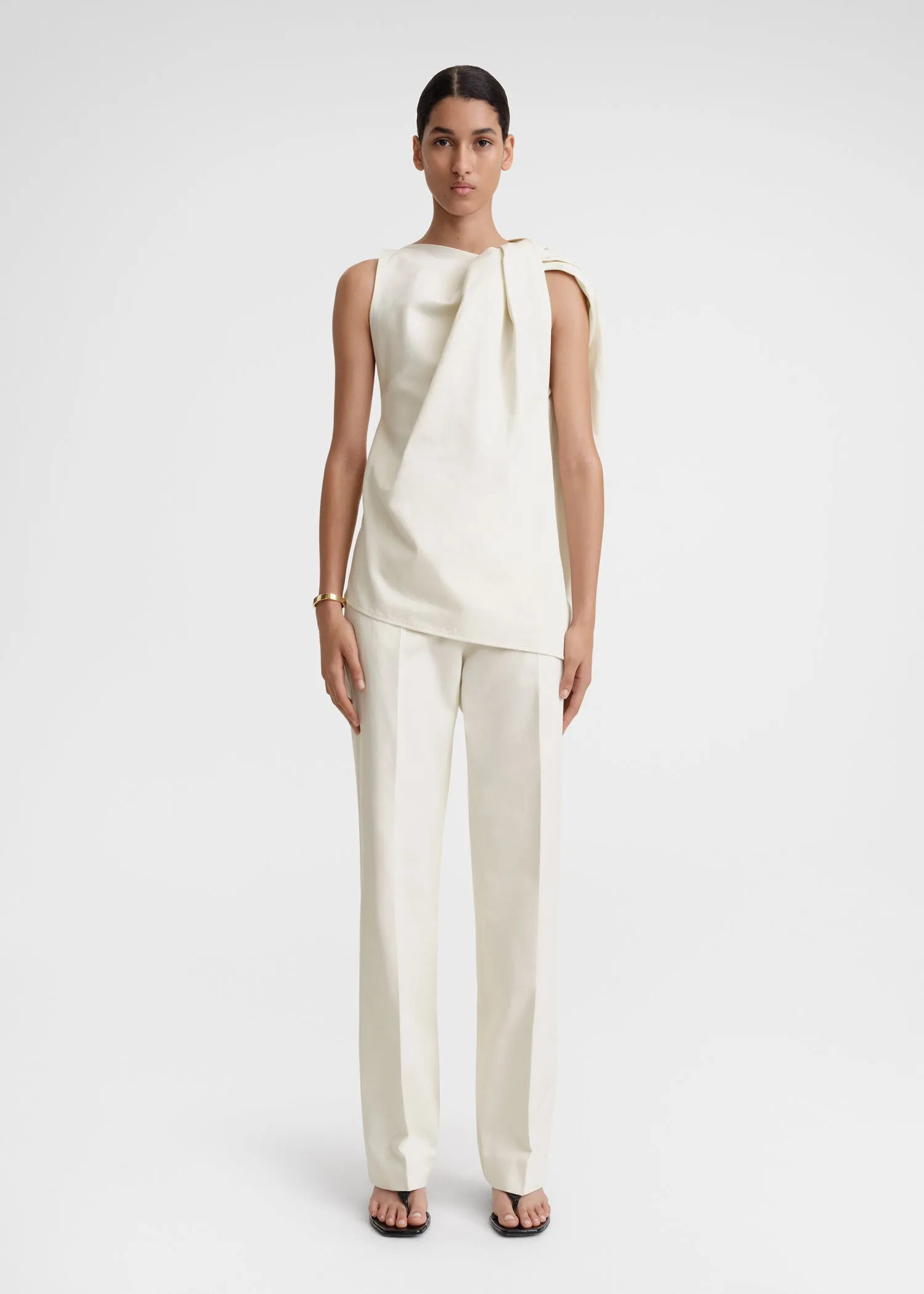 Shoulder-twist top ecru sold by Toteme