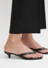 Leather heeled flip flops black sold by Toteme