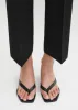 Leather heeled flip flops black sold by Toteme