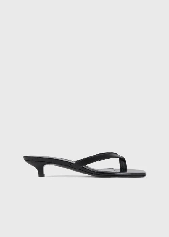 Leather heeled flip flops black sold by Toteme