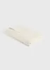Monogram jacquard towel off white sold by Toteme