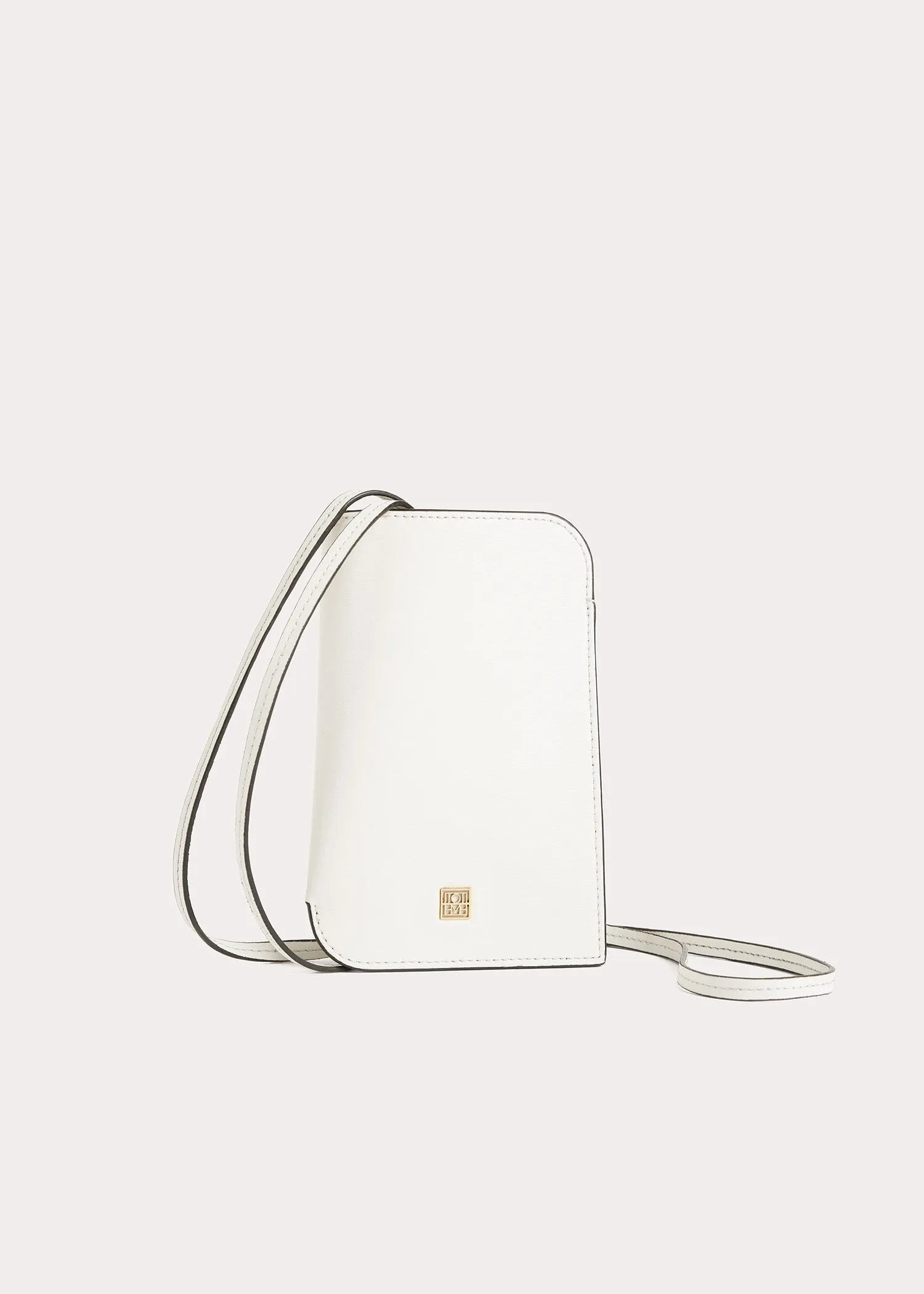Pocket leather pouch milk sold by Toteme