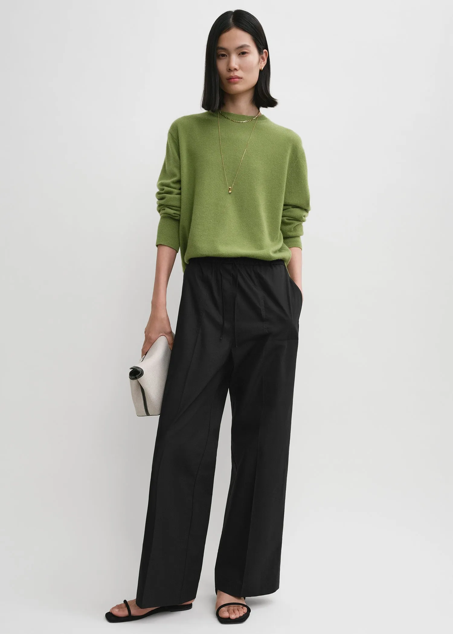 Cotton drawstring trousers black sold by Toteme