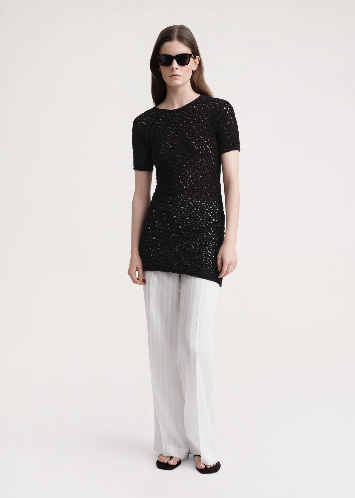 Crochet-knitted twist top black sold by Toteme