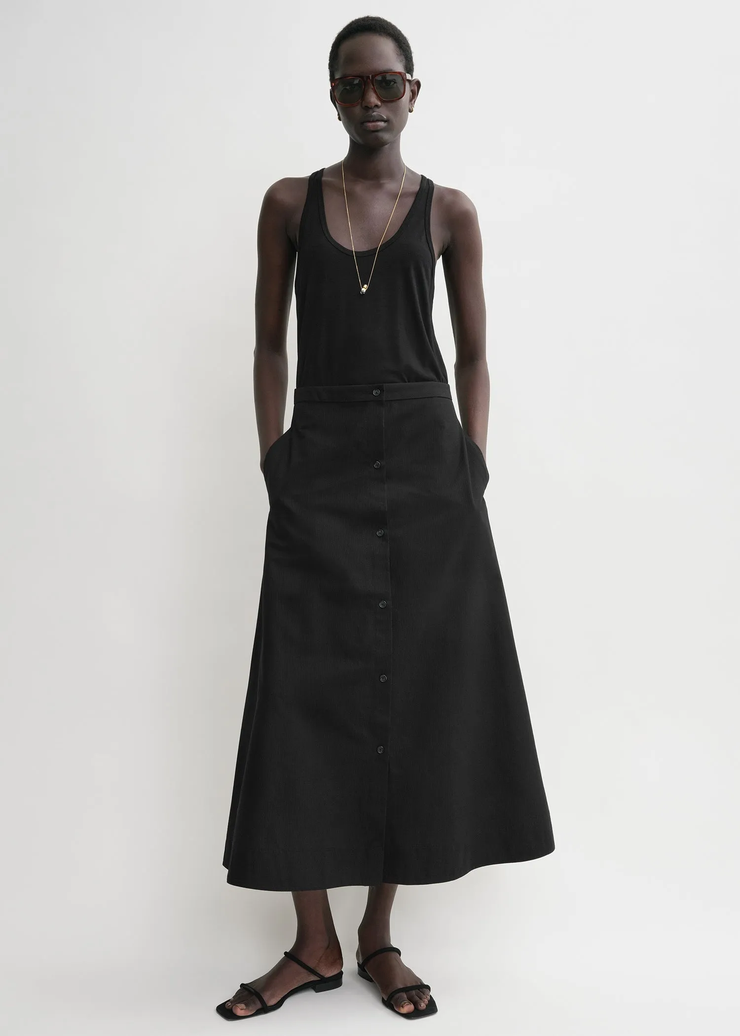 Jacquard stripe skirt black sold by Toteme