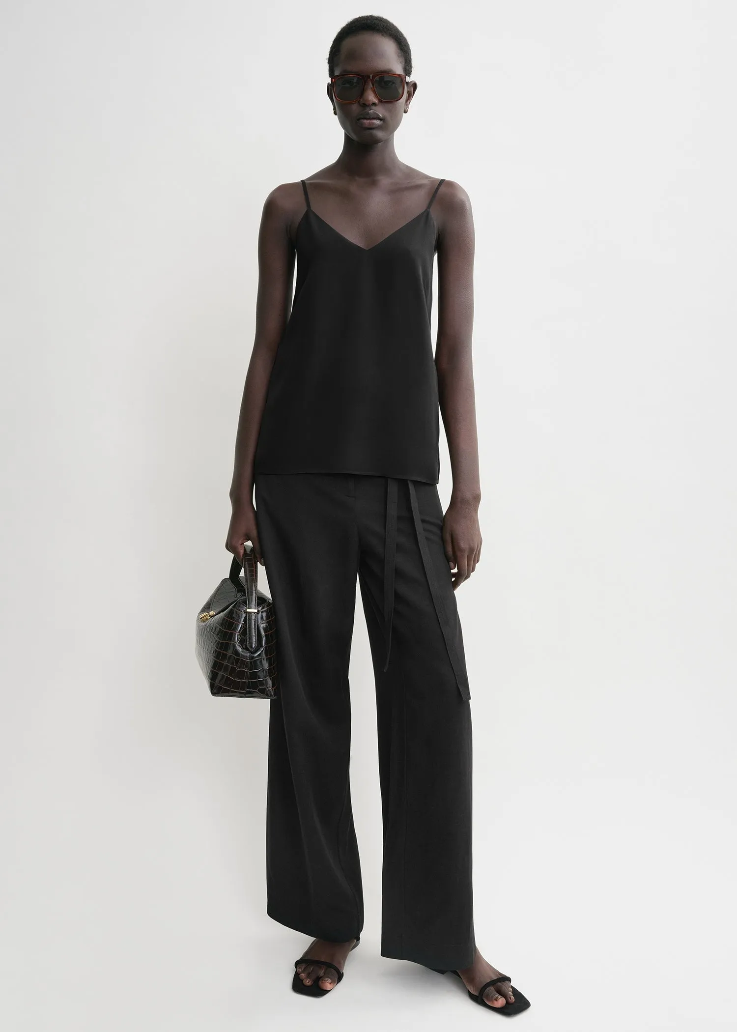 Crepe-back satin cami top black sold by Toteme