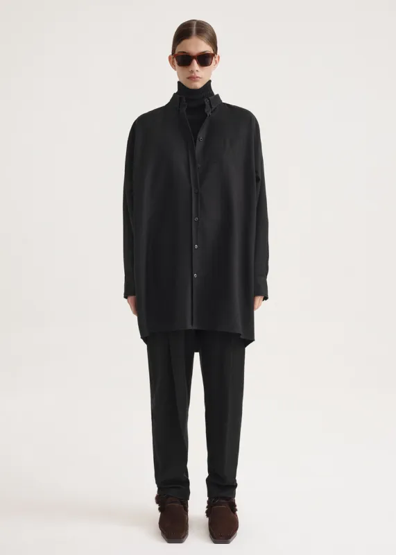 Long monogram wool shirt black sold by Toteme