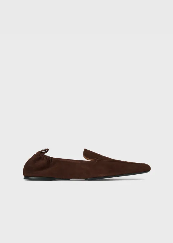 The Travel Loafer chocolate brown sold by Toteme