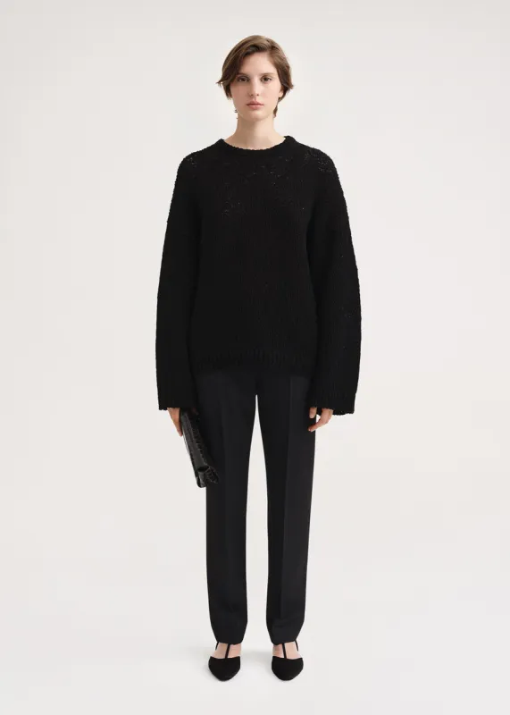 Textured cotton knit black sold by Toteme