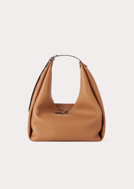 Grained-leather hobo bag tan sold by Toteme