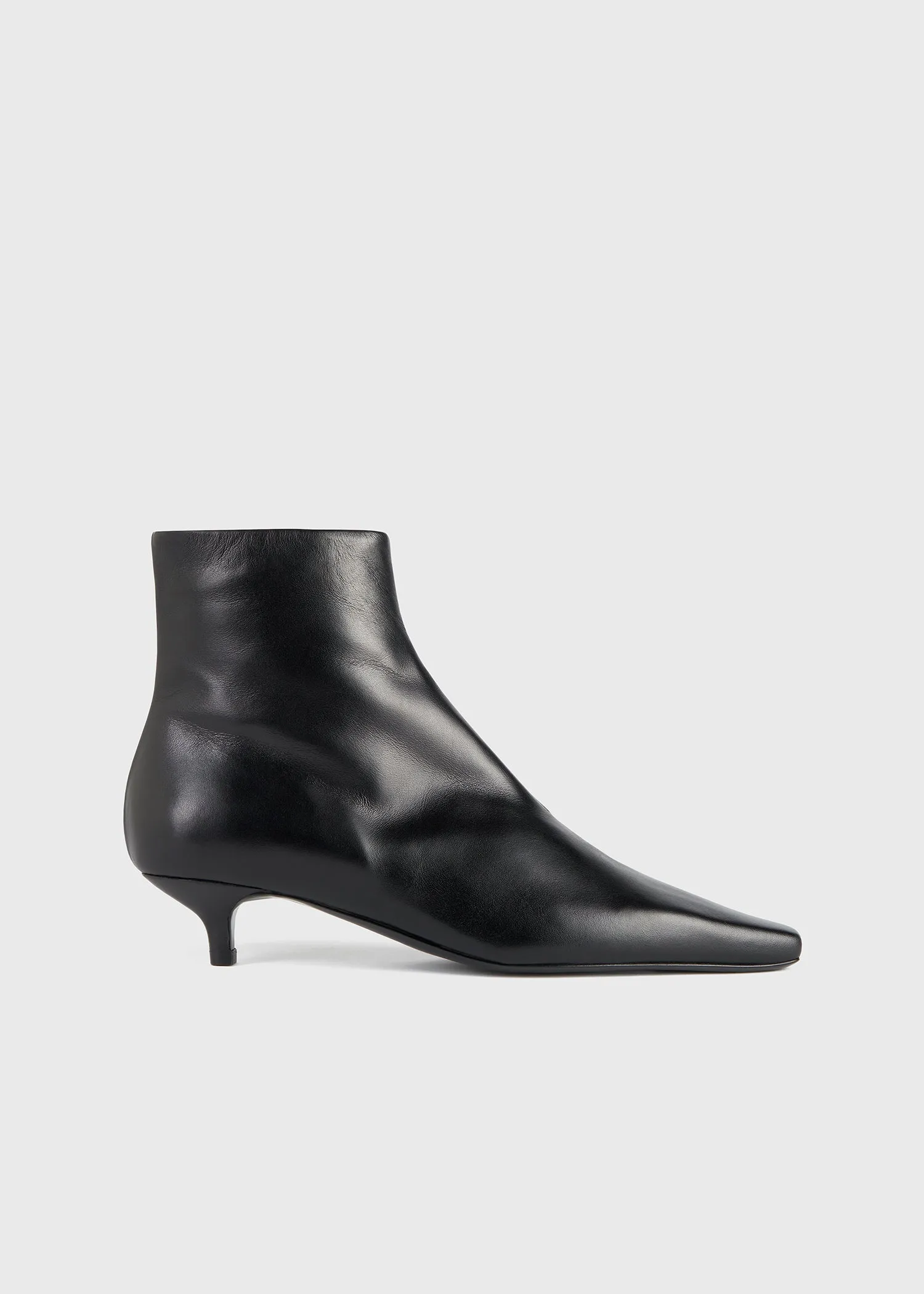 Slim leather ankle boots black sold by Toteme