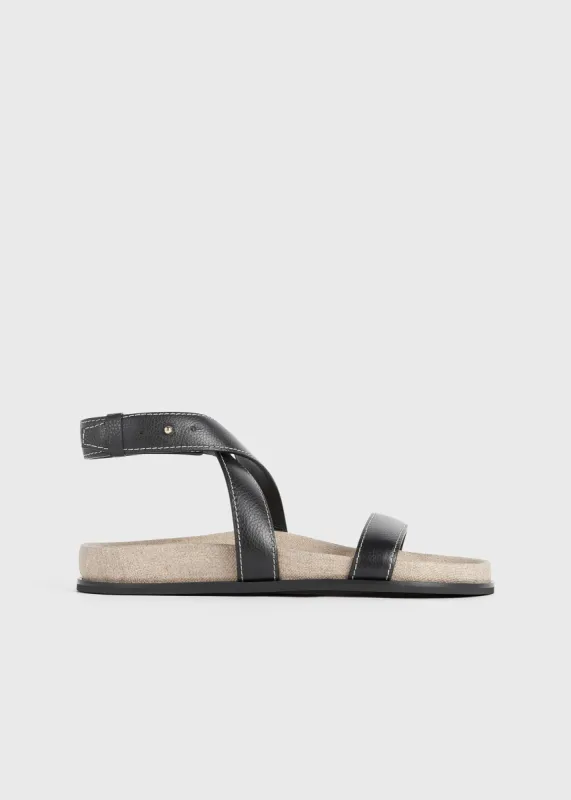 The Leather Chunky Sandal black/ecru sold by Toteme