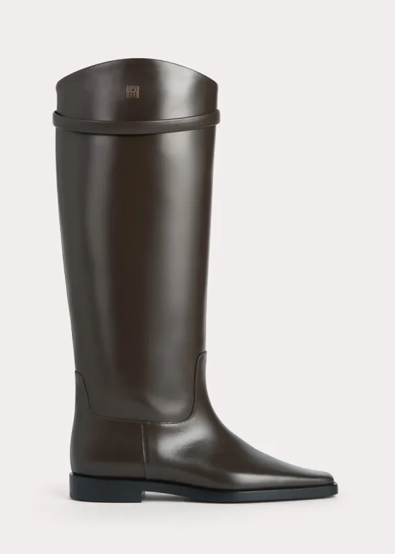 Leather riding boots coffee sold by Toteme