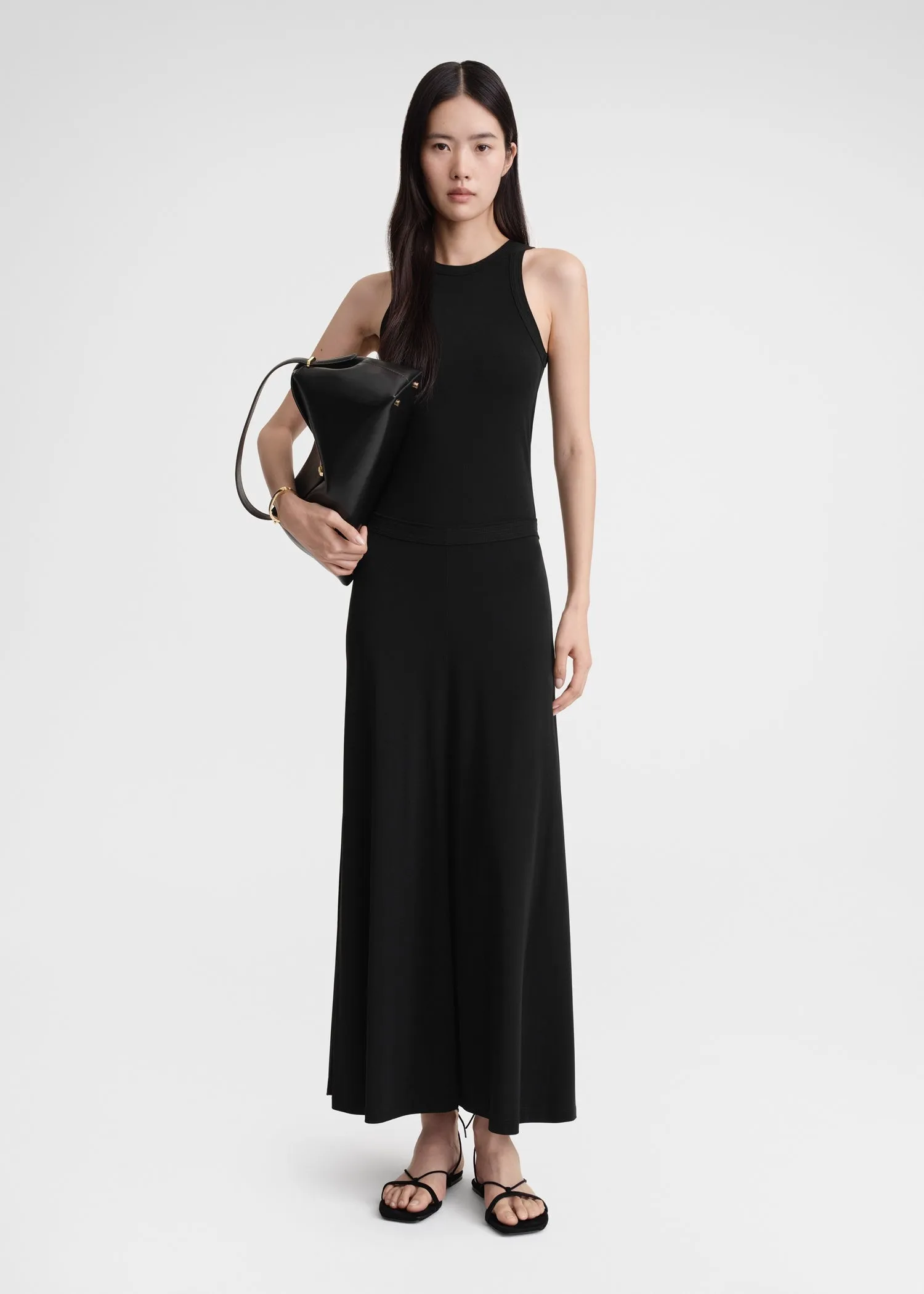 Fluid jersey skirt black sold by Toteme
