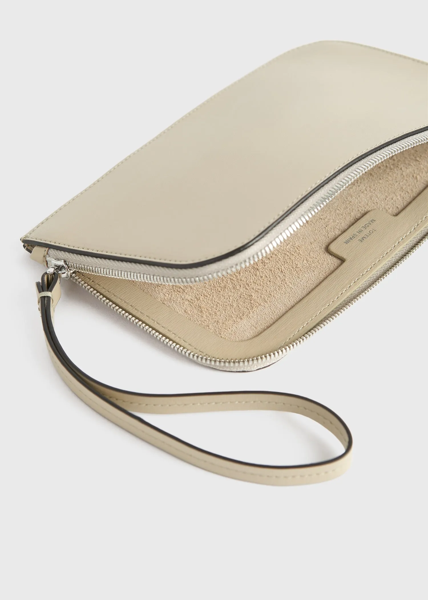 Monogram leather wristlet pouch fawn sold by Toteme product image thumbnail 5