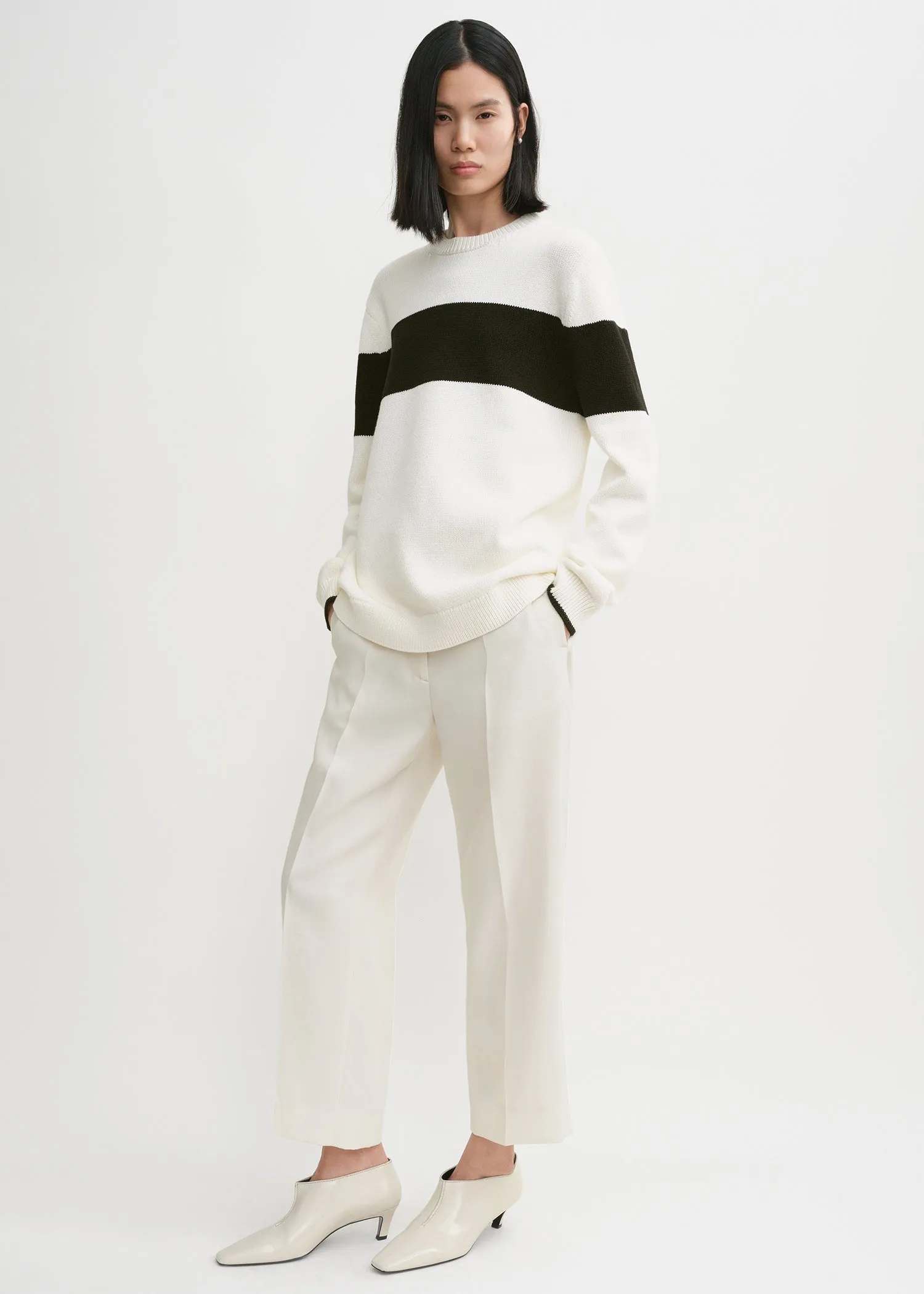 Contrast-stripe knit white/black sold by Toteme