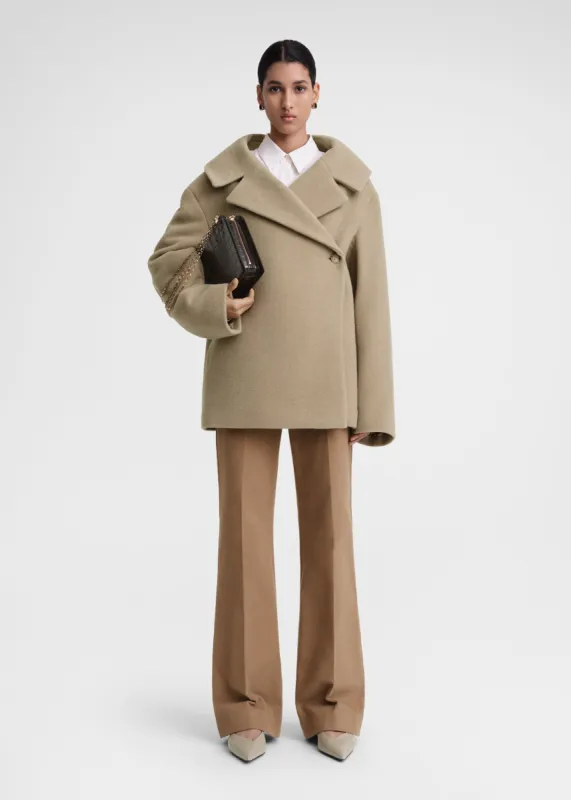 Felt wrap jacket biscuit sold by Toteme