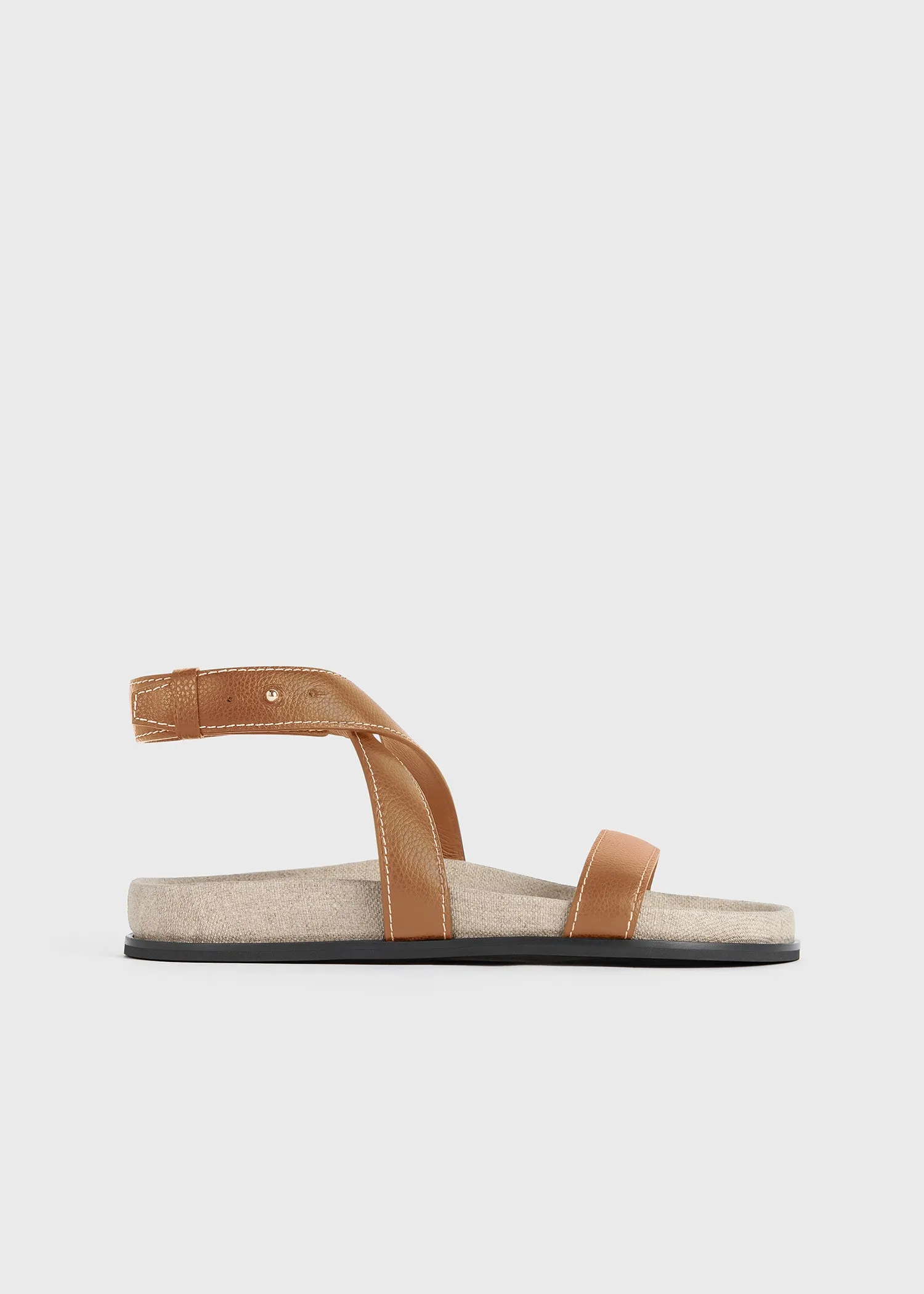 The Leather Chunky Sandal tan/ecru sold by Toteme